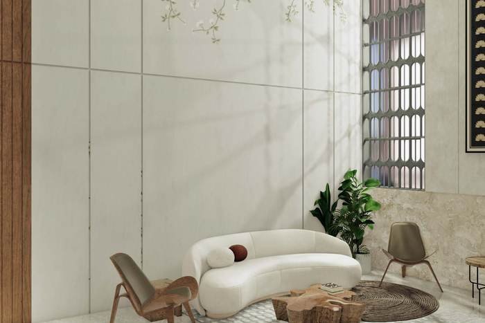 Clubhouse lounge seating at Acasa with stone and timber finishes