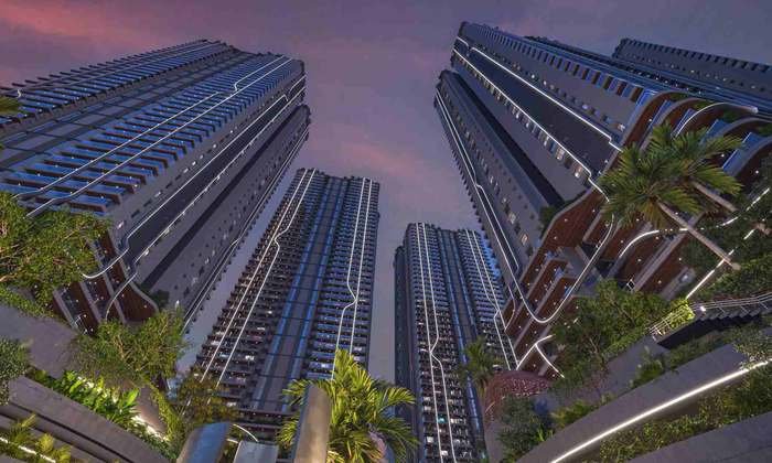 Night view of the Fortune Suraj Bhan Grandé towers at Kokapet with illuminated facade ribbons