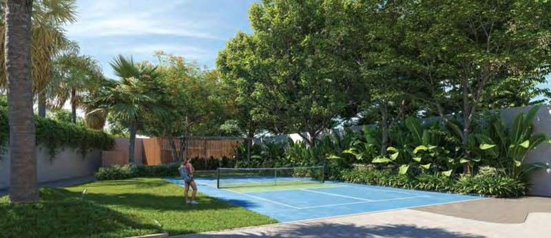 The pickleball court at Myscape Palma surrounded by mature trees and tropical planting