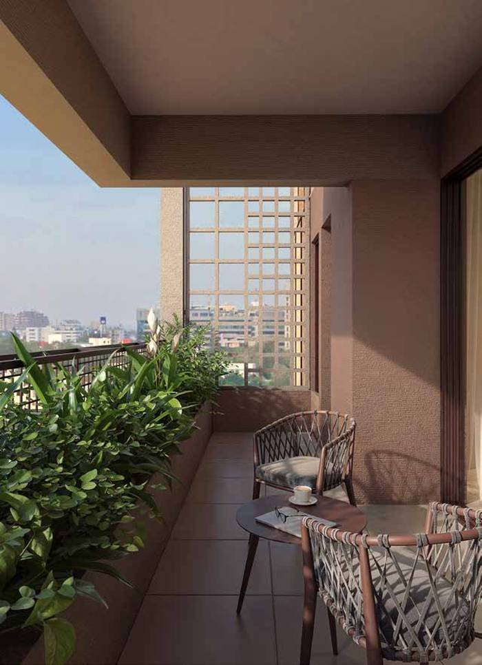 A 2 m deep balcony at Myscape Songs of the Sun with planter boxes running its full length.