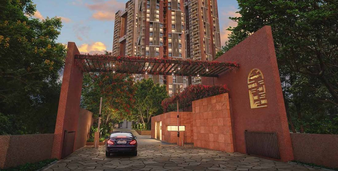 Myscape Songs of the Sun, Financial District, Hyderabad: the arrival portal and landscaped driveway at Puppalaguda, with a tower rising behind it.