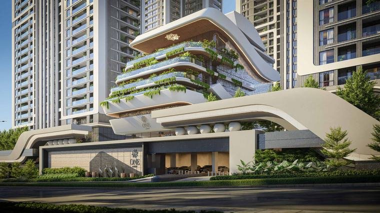 The Club One clubhouse building at One by MSN, Neopolis, with planted terraces above the arrival court
