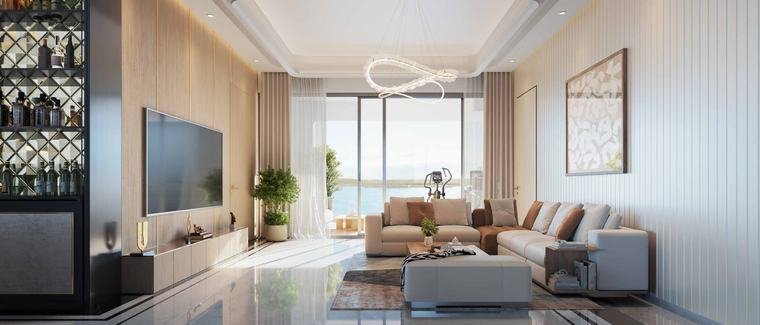 Living area in a 4 BHK residence at One by MSN opening to a balcony over the lake