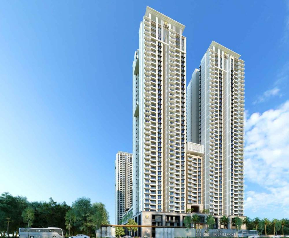Prestige Clairemont at Kokapet, Hyderabad: the four residential towers rising above the podium, seen from the approach road