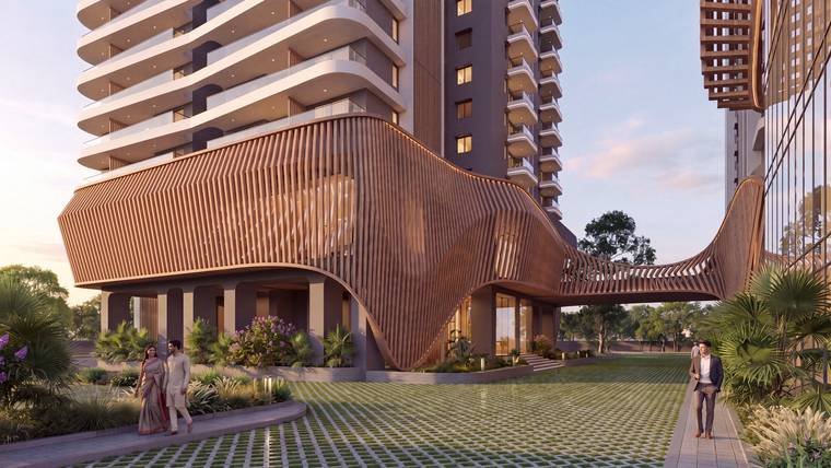 Curved fluted podium façade at Raghava Halo, Kondapur, with landscaped lawn in front