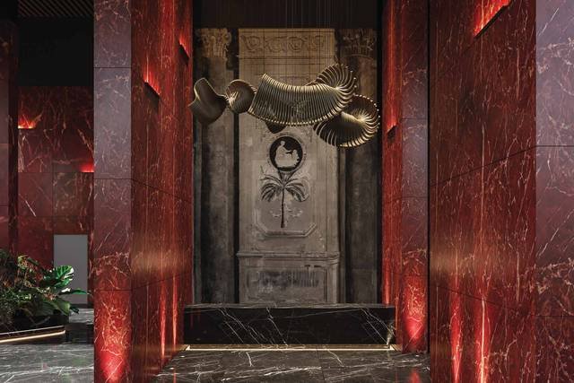 Red marble triple-height lobby of 9 South at Rise With 9, Neopolis