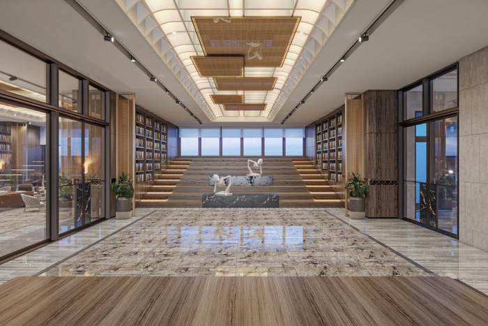 Indoor amphitheatre with tiered seating in the Skyven Kokapet clubhouse