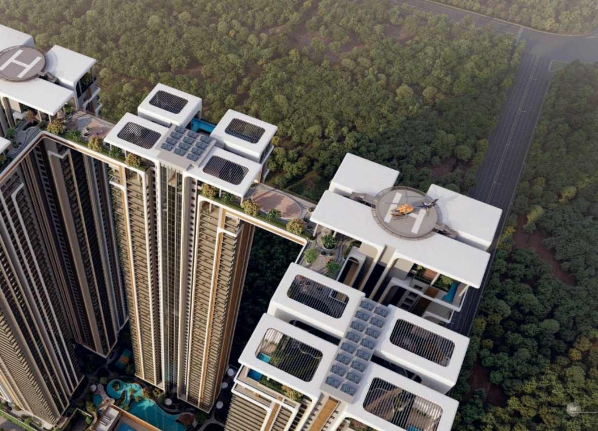 Aerial view of the five towers of The Cascades Neopolis at Neopolis, Kokapet, Hyderabad, over the podium landscape and lagoon pool